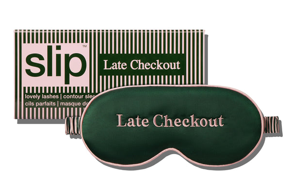 Sleep mask with 'Late Checkout' embroidered text and 'slip' packaging on a white background