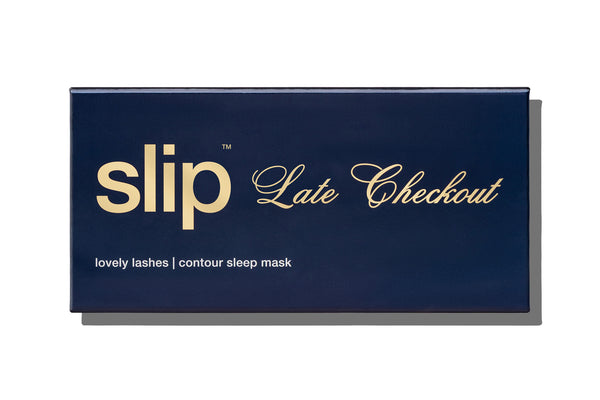 A rectangular navy blue product box with gold and white text reading 'slip Late Checkout' and 'lovely lashes | contour sleep mask' on a clean white background.