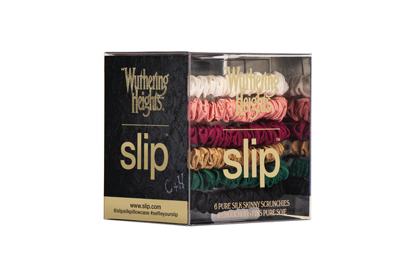 Box of 'Wuthering Heights' slip scrunchies with colorful scrunchies inside on a white background.