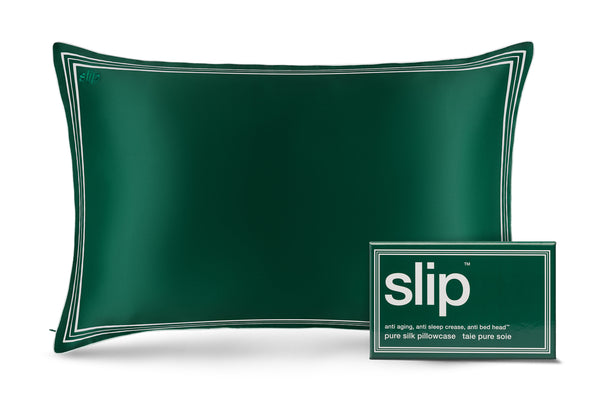 Green silk pillowcase with 'slip' branding and packaging on a white background