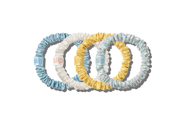 Set of colorful scrunchies on a white background