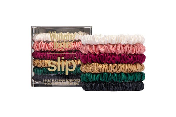 Set of colorful slip scrunchies with a branded Wuthering Heights box on a white background